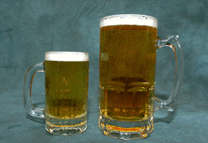 A glass mug on a table

Description automatically generated