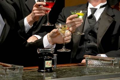 A person drinking from a glass

Description automatically generated