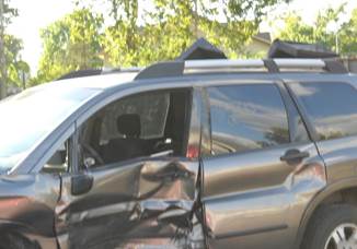 A car parked in a parking lot

Description automatically generated