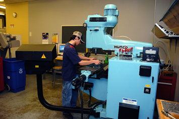 A picture containing indoor, floor, wall, man

Description automatically generated